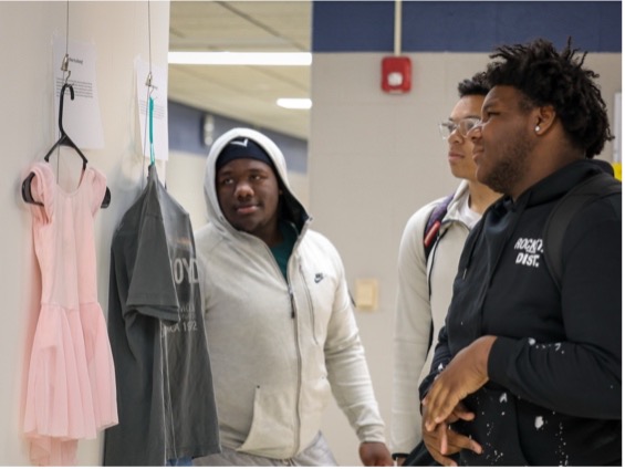 students looking at exhibit